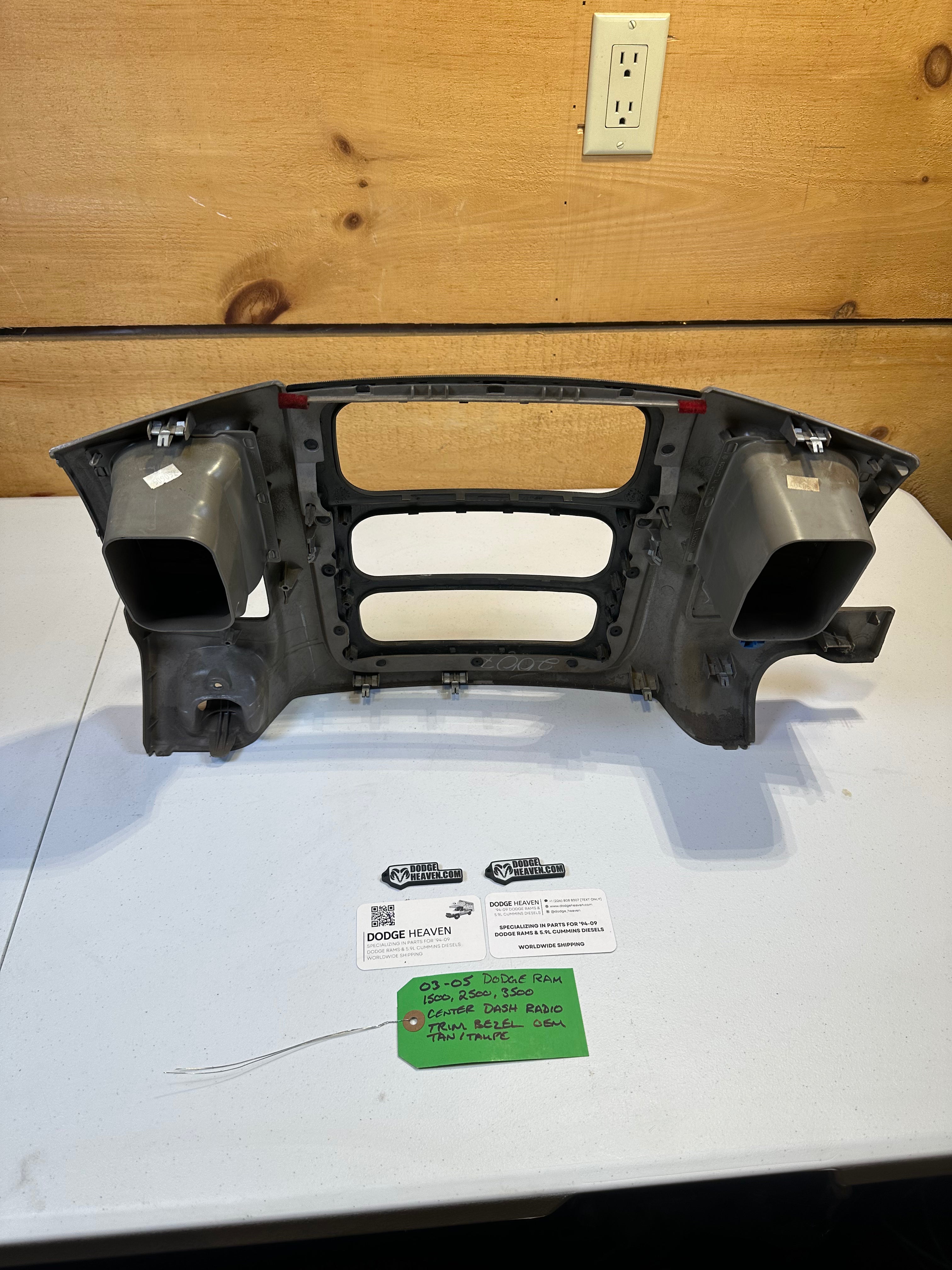 2003-2005 Dodge Ram 1500 2500 3500 Radio Dash Center Bezel Tan / Taupe (OEM)