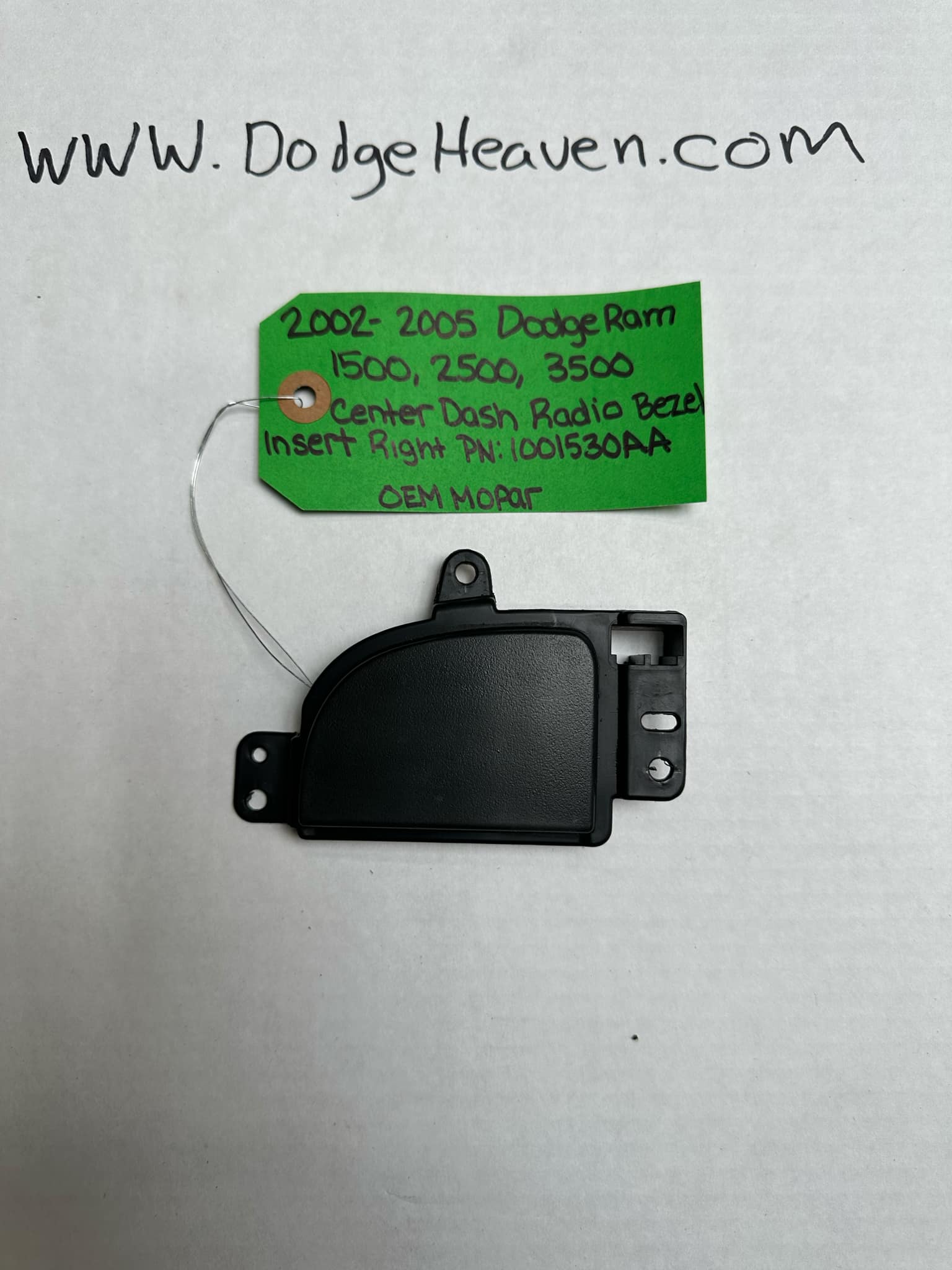 2002-2005 Dodge Ram 1500/2500/3500 Dashboard Center Bezel Passenger-Side Insert (OEM)