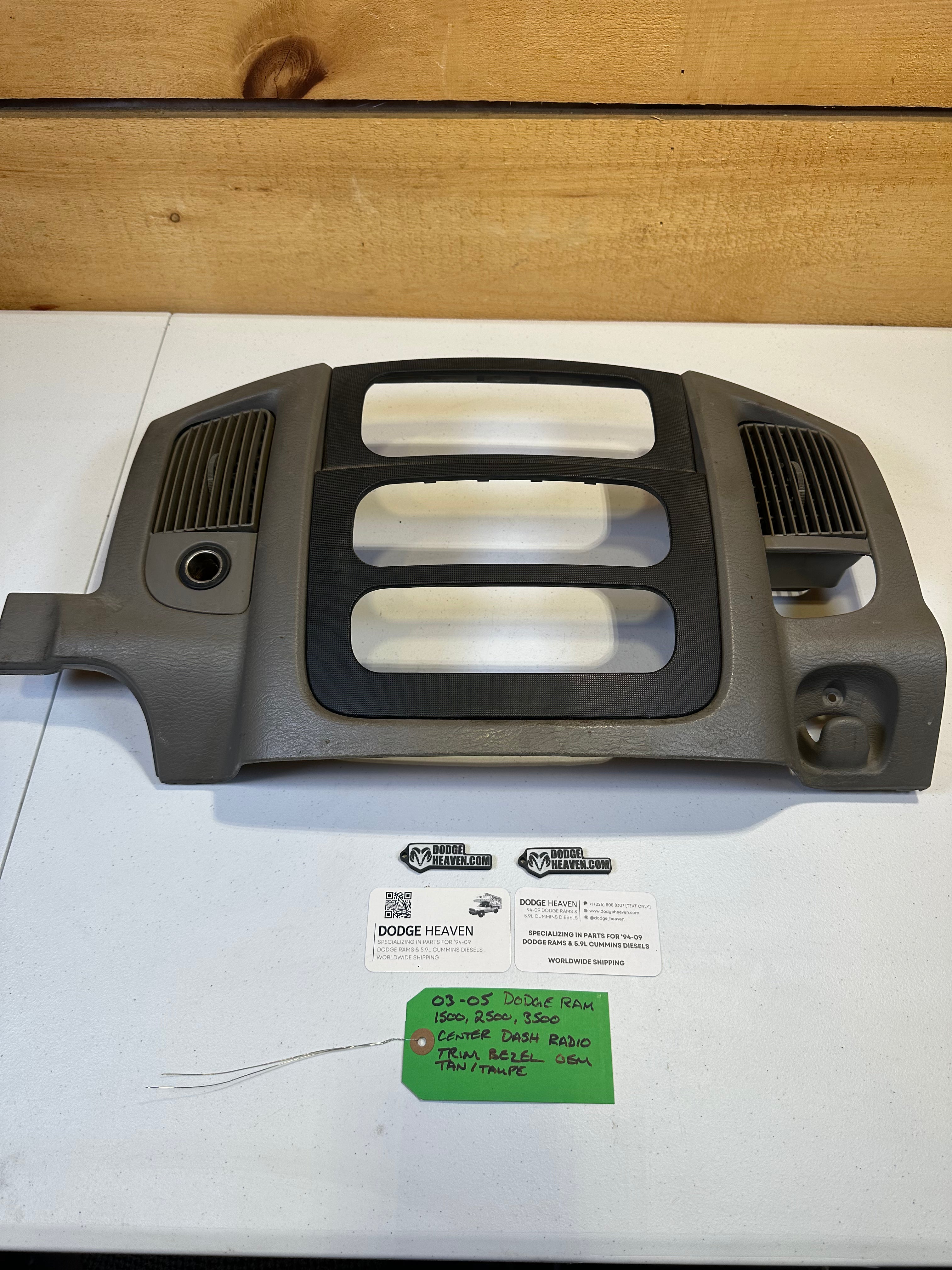 2003-2005 Dodge Ram 1500 2500 3500 Radio Dash Center Bezel Tan / Taupe (OEM)