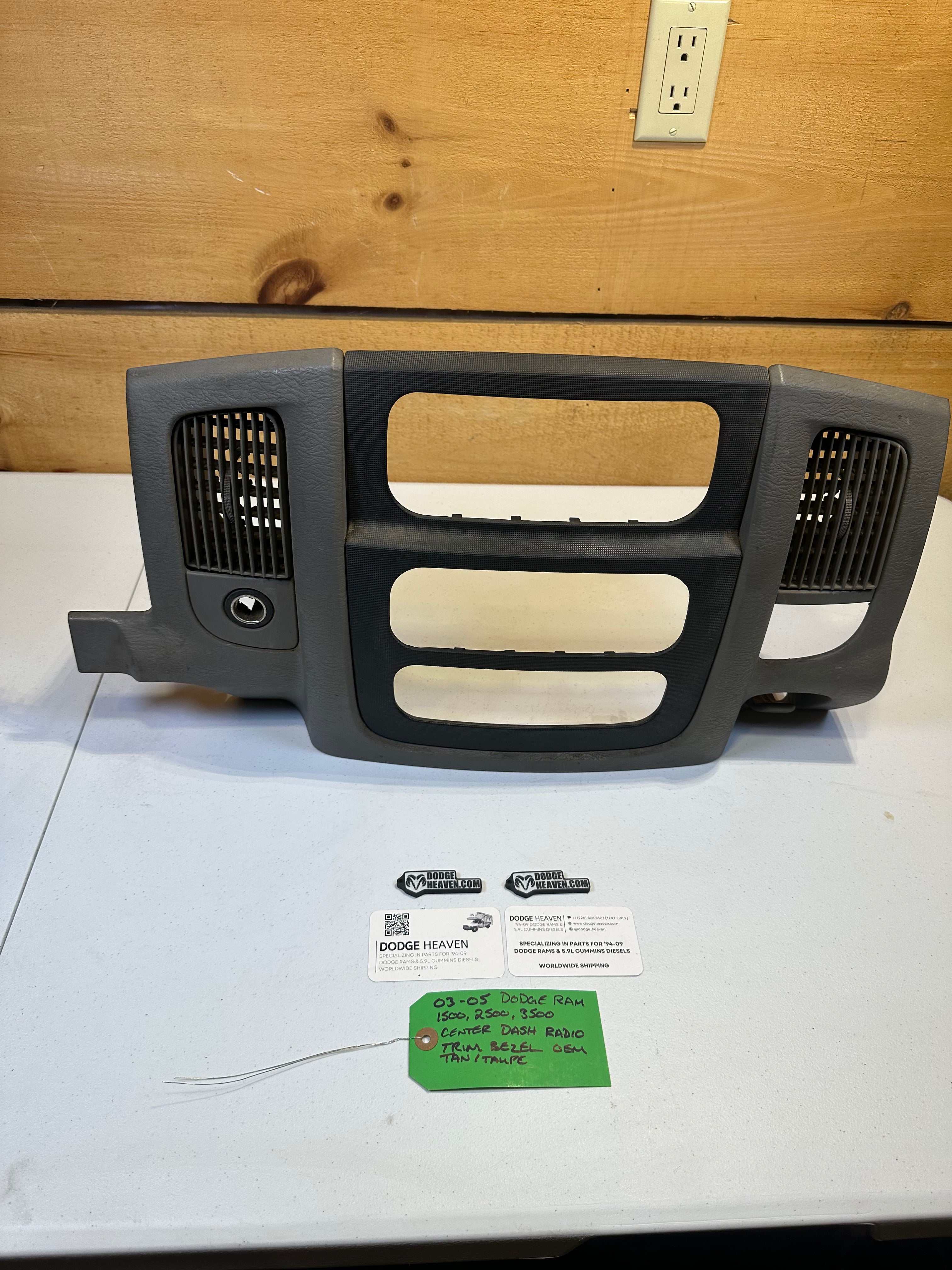 2003-2005 Dodge Ram 1500 2500 3500 Radio Dash Center Bezel Tan / Taupe (OEM)