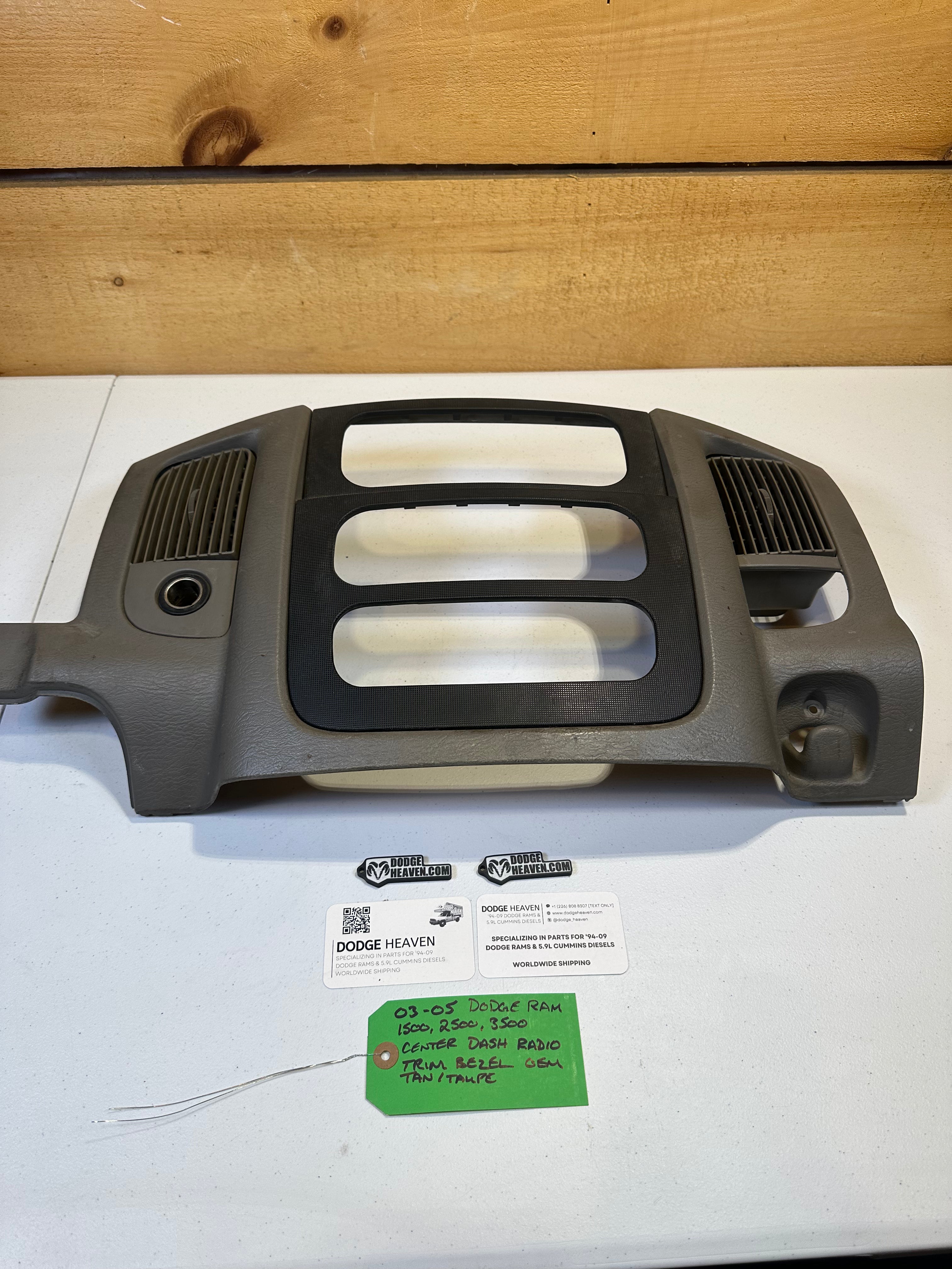 2003-2005 Dodge Ram 1500 2500 3500 Radio Dash Center Bezel Tan / Taupe (OEM)